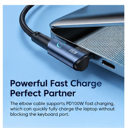 A dark blue and black USB-C elbow cable shown plugged into a laptop on a light blue background, with promotional text reading 'Powerful Fast Charge Perfect Partner' and additional charging claims.