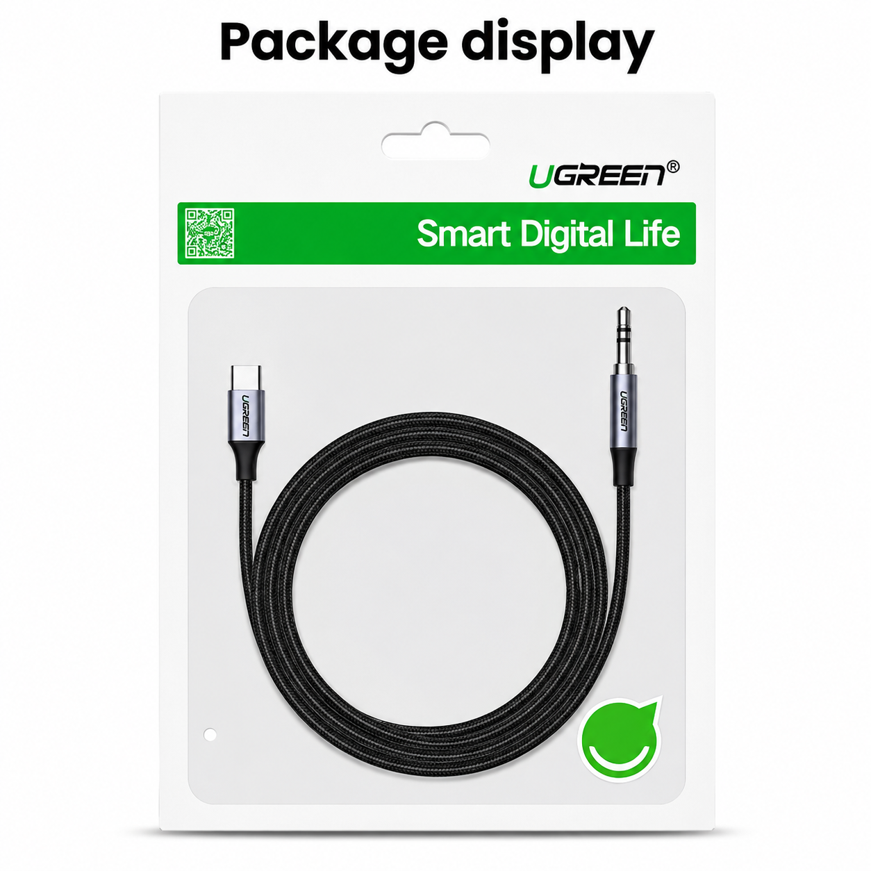 UGREEN USB-C to 3.5mm audio adapter cable in its original retail packaging, featuring a black braided cable coiled inside a white blister pack with green branding.