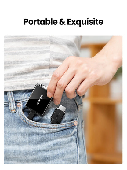 A person wearing blue jeans and a gray striped shirt inserts a small black USB receiver into their pocket, with another matching device tucked beside it. The text 'Portable & Exquisite' appears at the top on a white background.