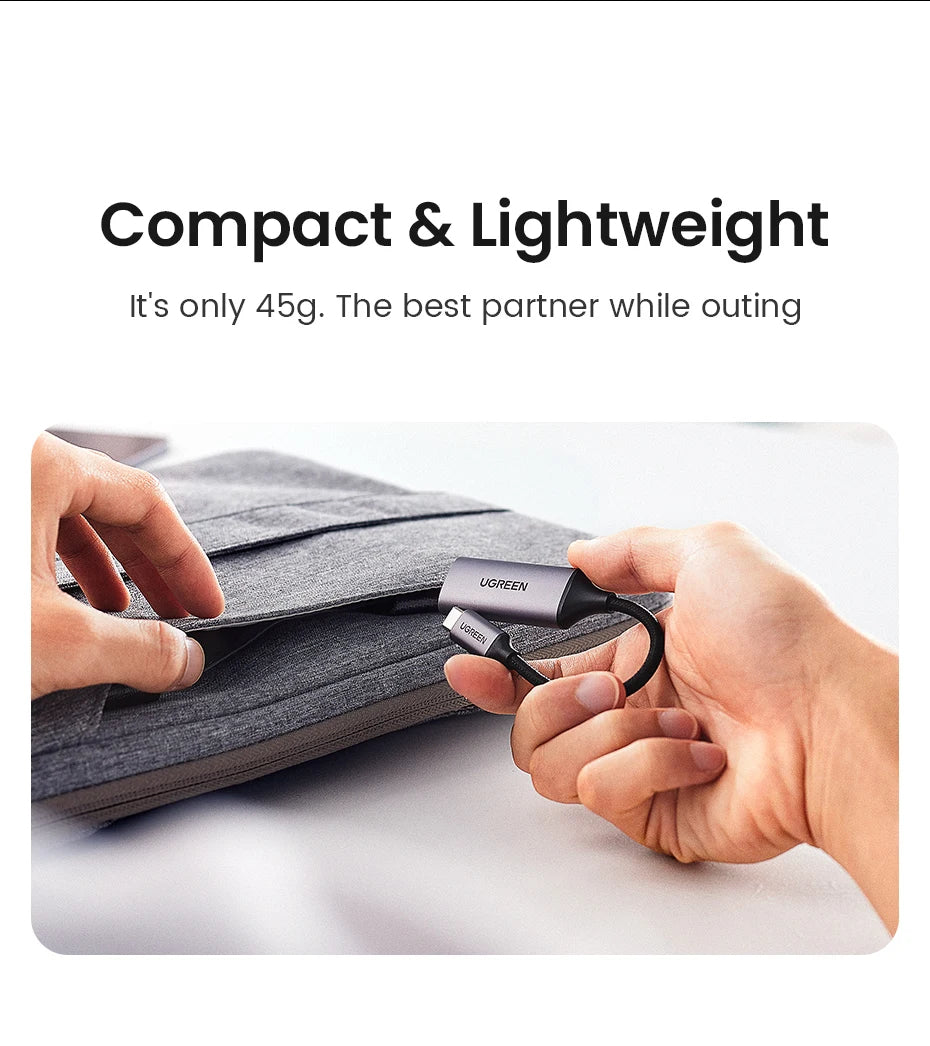 Compact and lightweight device being held by a person with text highlighting its weight and portability.