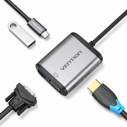 Vention USB-C to HDMI adapter with a silver metal body, black cable, USB-C to USB-C cable, and a small USB flash drive on a white background.