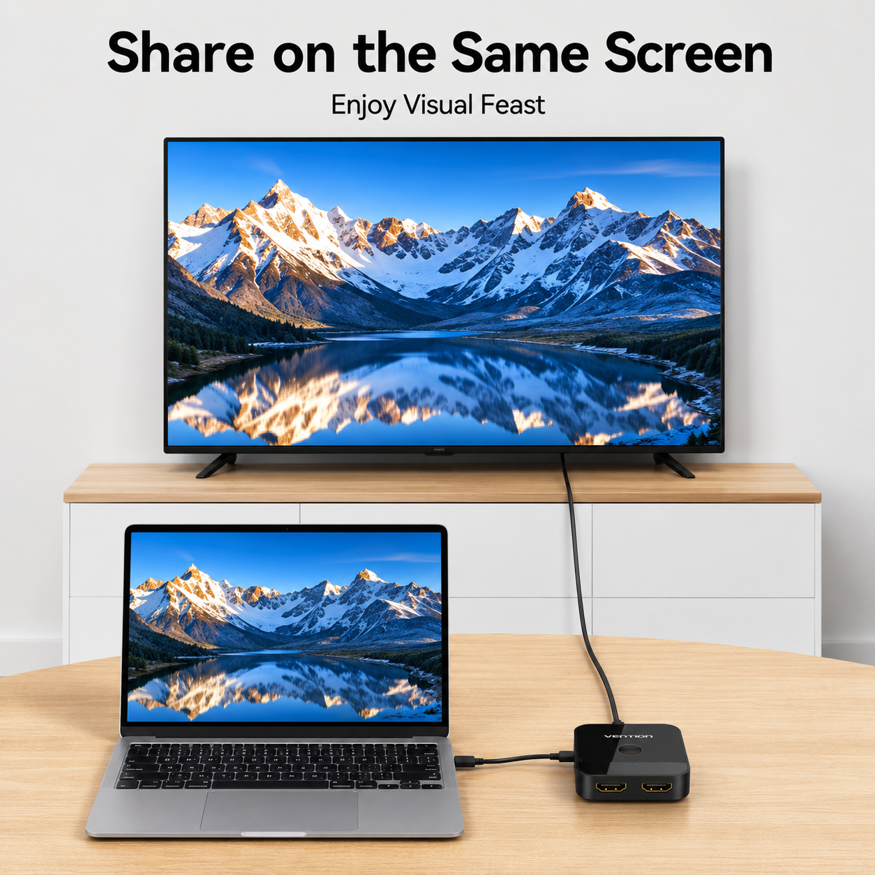 A screen sharing setup showing a large TV and a laptop on a wooden table, both displaying the same mountain lake landscape, with a small black HDMI receiver in the foreground. Text at the top reads 'Share on the Same Screen' and 'Enjoy Visual Feast'.