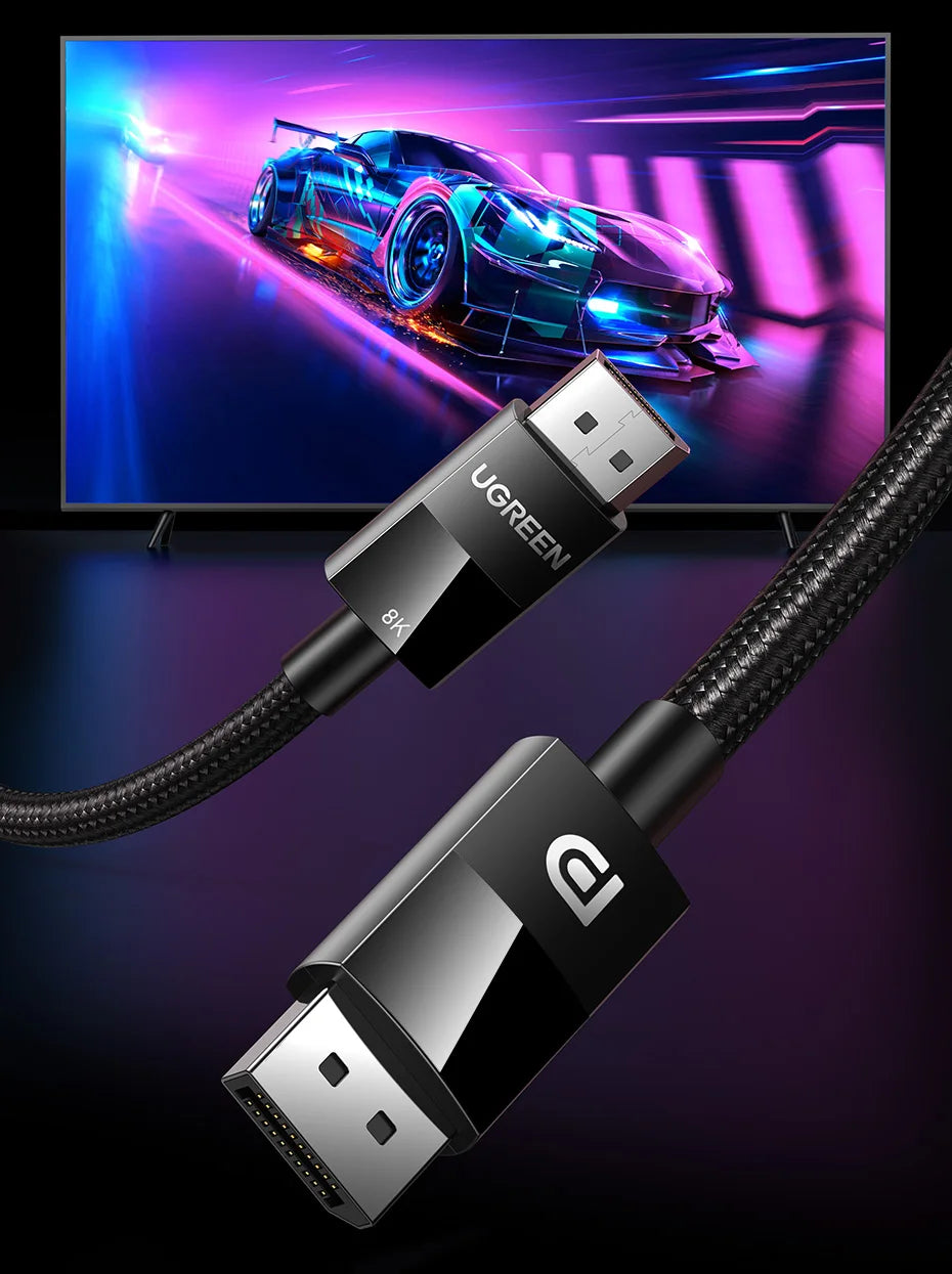 UGREEN HDMI cable shown in a clean product render with two black connector ends and a braided black cable, set against a dark studio background with a TV screen displaying a neon car scene behind it.