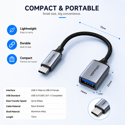 A compact USB-C to USB-A adapter cable with metallic silver ends, shown on a light blue background with feature icons, dimensions, and a material/specification table. The brand VENTON is visible on the connector housings.