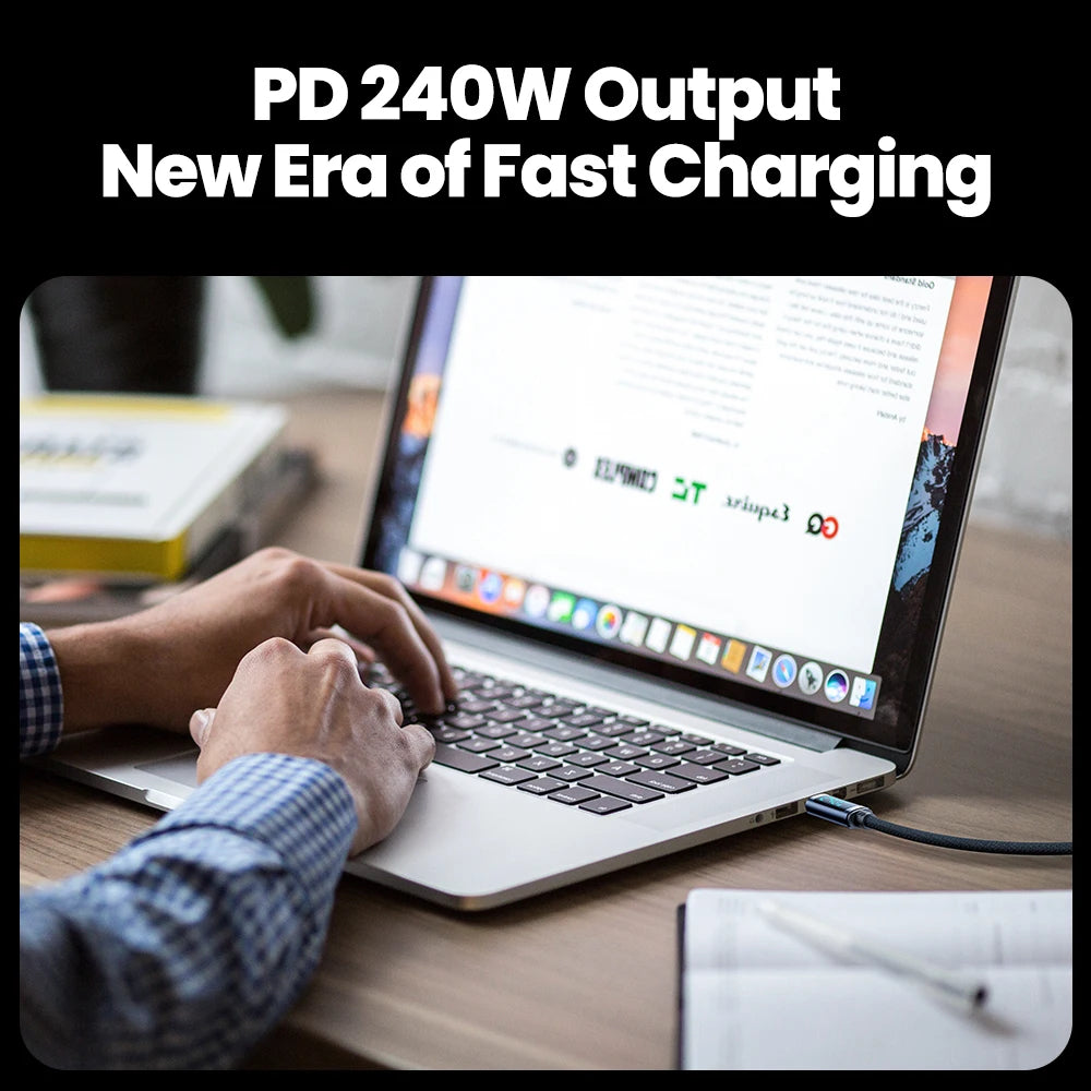 Person using a laptop with a power adapter, emphasizing fast charging technology.
