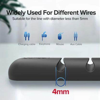 Black cable management tool with illustrations of cables and text on a light gray background