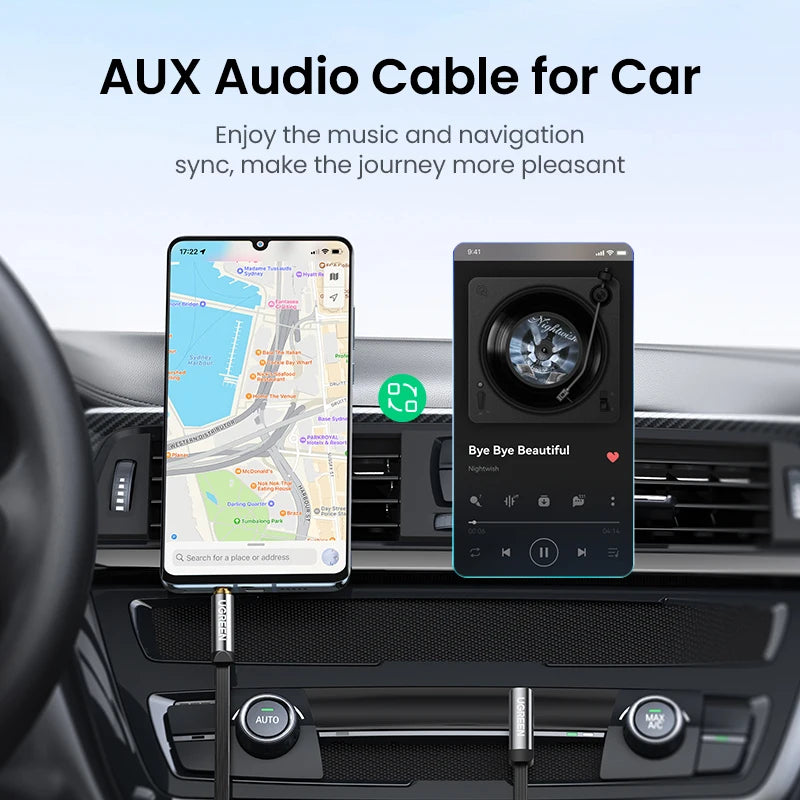 A black AUX audio cable for car use shown mounted between two smartphones placed on a car dashboard. The left phone displays a map, and the right phone shows a music player.