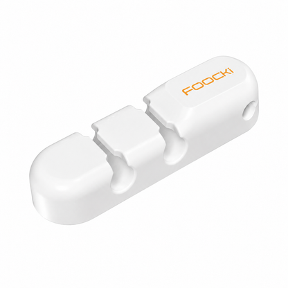 A white plastic 3-in-1 toothbrush holder with the brand name 'FOOCKI' printed in orange on the top, shown on a clean white background.