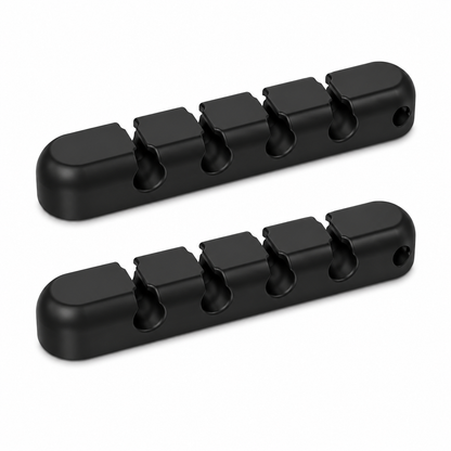 Two black metal guitar tailpiece covers shown on a plain white background.