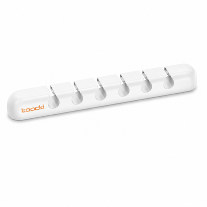 A white plastic 6-in-1 tooth storage organizer with six individual slots, featuring the orange 'toocki' brand logo on the left side, shown on a clean white background.