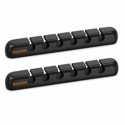 Two black Toocki sharpening steel guides shown on a clean white background, angled parallel to each other with the brand name 'toocki' printed in orange on the left end of each.