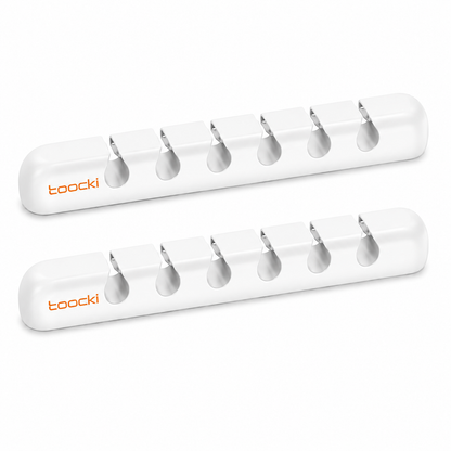 Two white Toocki cable protectors with six metal spring clips each, displayed on a clean white background.