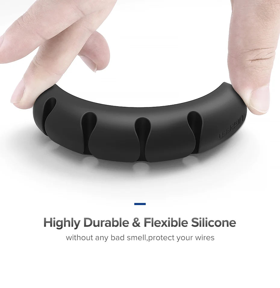 Black silicone cable protector being held by a hand on a white background with text about durability and flexibility.
