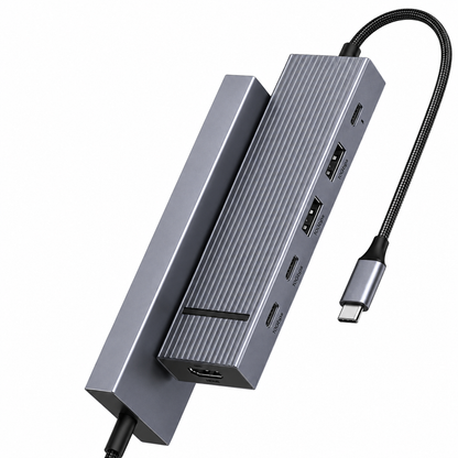 A silver aluminum laptop hub with a black braided cable, featuring multiple ports including USB-C, USB-A, HDMI, and RJ45, shown on a plain white background.