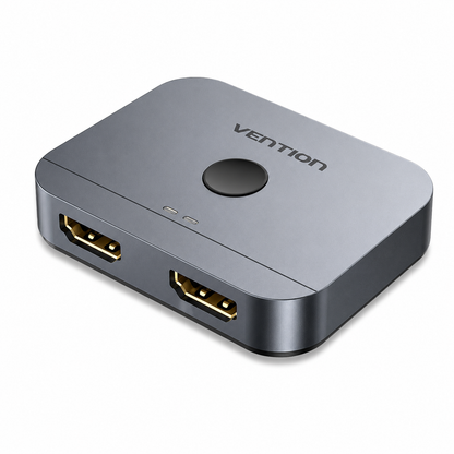 A Vention 2-port HDMI splitter box in a metallic dark gray finish with gold-plated connectors, shown on a clean white background.