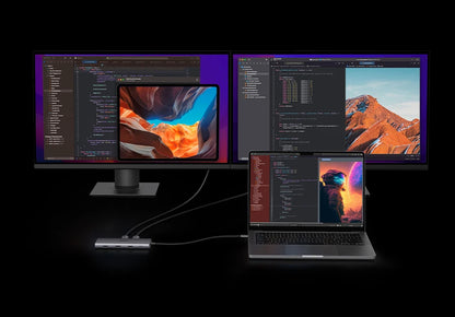 Two monitors and a laptop displaying a cohesive design theme with nature-themed wallpapers.