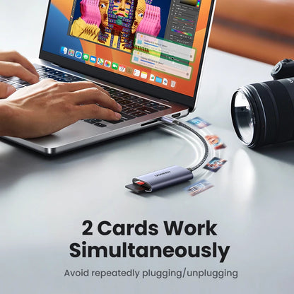Laptop with a camera and two cards on a desk, with text '2 Cards Work Simultaneously'.