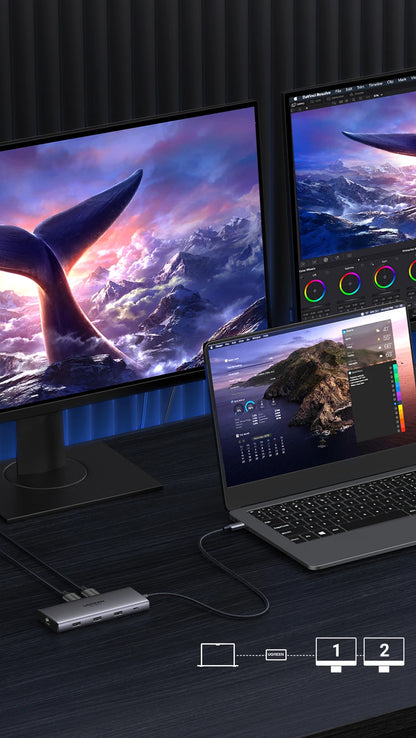 Two monitors and a laptop displaying nature-themed wallpapers on a dark surface.