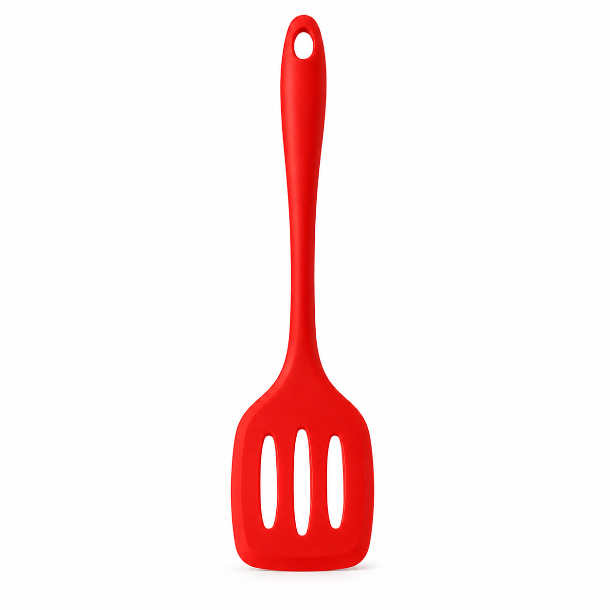 A bright red silicone spatula with three slotted holes in the head and a hanging hole at the top of the handle, shown on a plain white background.